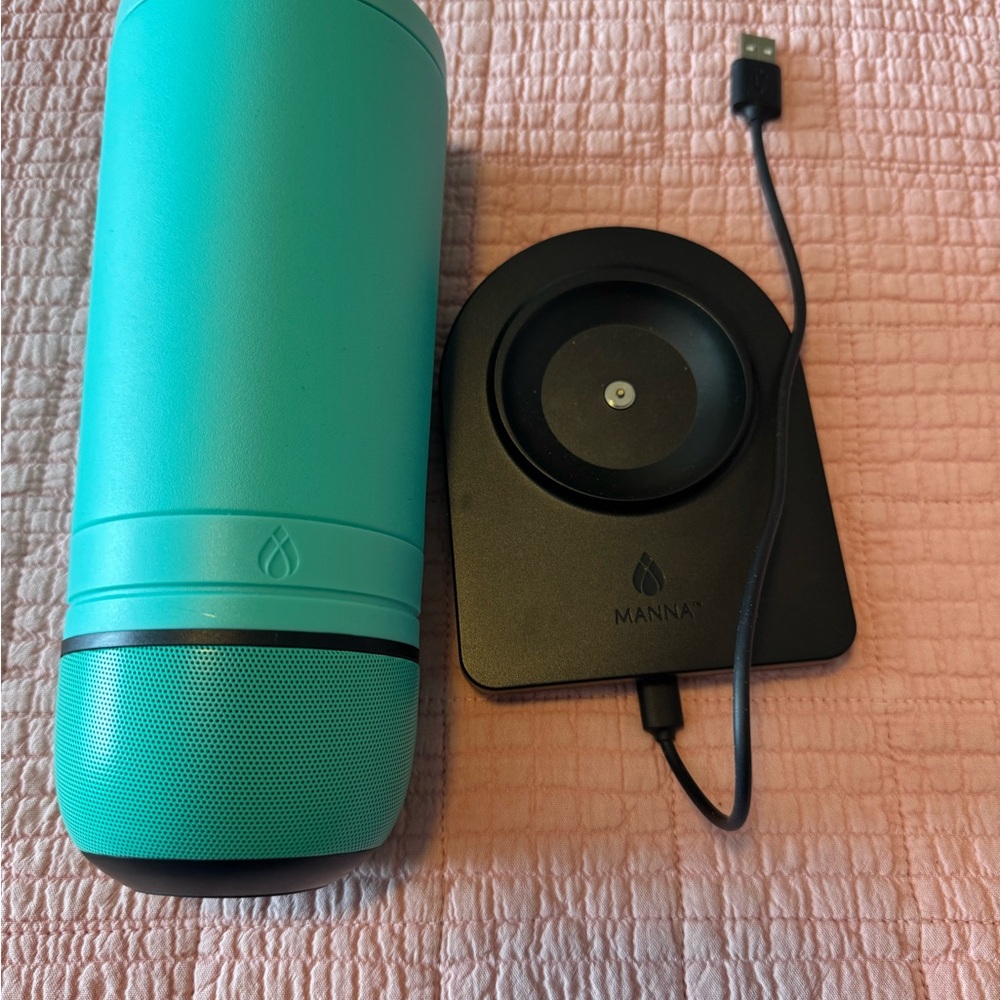 Manna Portable Bluetooth Speaker and stainless steel mug with Charging Pad